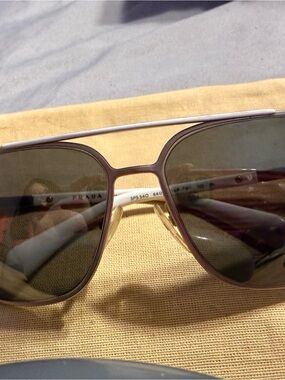 Prada White Sunglasses with Gold Accents